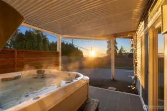 Covered hot tub area off the Primary