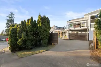 Gated entry to lower backyard and parking