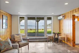 The lower floor is a 1 bedroom ADU with a walk out to the waterfront.