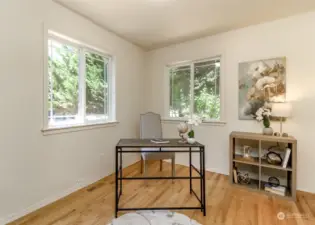 French doors lead to this gorgeous office with oak floors, two windows offering lots of natural lighting. 3/4 bath is to the right of this room.