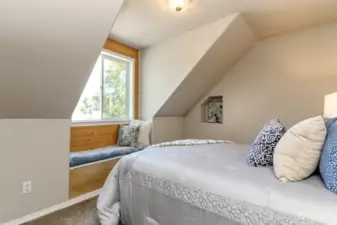 Technically not a bedroom due to no closet, but used as a guest room upstairs with the other two extra bedrooms.  Wall nook has an electric outlet for your kuerig!