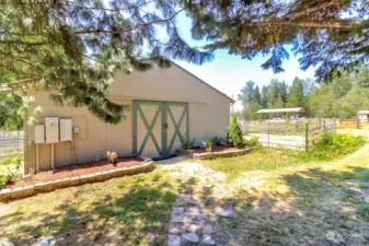 34' x 60"   8 stall barn with hot and cold wash station, tack room, hay storage room and washer / dryer hookup for convenience. Additional built on storage on the back of barn for even more storage and chicken coop.