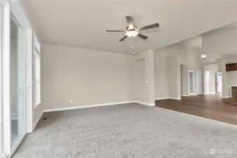 Living room includes ceiling fan as a standard feature. Photo for illustration only, not actual