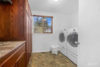 Upstairs laundry room is just off the large bonus room/craft room.   So convenient for multi tasking!