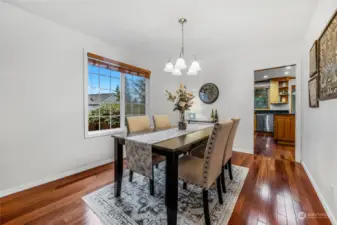 Dining area overlooks side garden, and has room to expand for nearly  any size table.