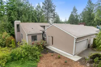 Convenient attached garage with updated doors and millwork—plus extra storage potential.