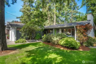 Gorgeous mature, low-maintenance landscaping in surrounds this home on all sides and really elevates your surroundings. Every window has a view of greenery and year-round shade, privacy and PNW beauty.