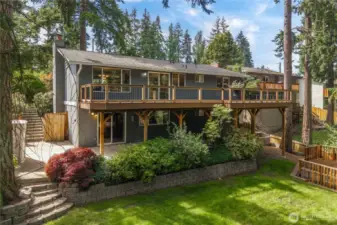 This home is bigger than the front makes it seem! Upstairs is a massive Trex deck that stretches the entire length of the home with tons of room for entertaining of peaceful outdoor living.