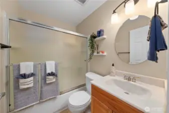 Upstairs full bath off main hallway.