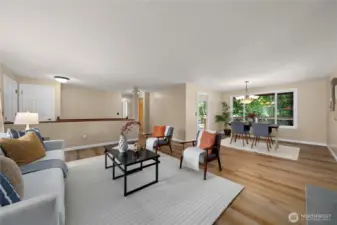 The dining room also has large picture windows that look out onto your massive upper deck and the greenbelt beyond.