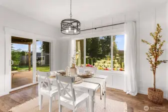 Slider leads to covered patio and back yard