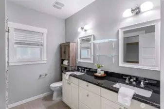 Primary Bathroom has double sinks and large walk-in shower