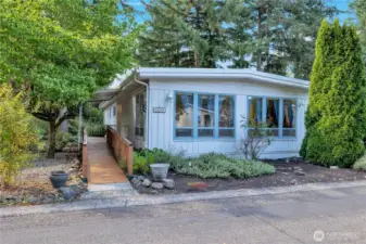 Located in the far cul de sac on the other side of the bridge in Friendly Village. This home is very well-maintained and has many updates.