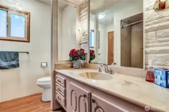 Main bathroom has a new toilet & new fan.