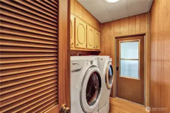 The washer and dryer stay. They are conveniently elevated, sitting atop pedestals. Clothes washing day will be so much easier!