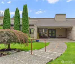 Friendly Village has a terrific clubhouse. Inside is the park manager's office, a large meeting room, library, gaming room with pool table & ping pong table, kitchen, laundry, bathrooms & exercise area. Behind the clubhouse is the heated swimming pool, shuffleboard, patio & doggy park.