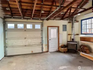 Garage interior.  Wood stove!