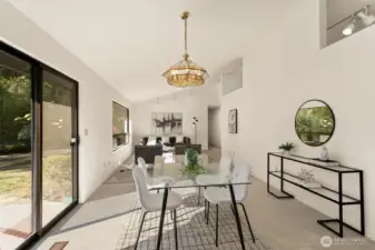 Kitchen flows into dining room and second living area
