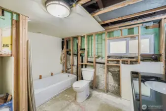 Partially finished and plumbed full bath, just needs the finish work.