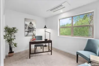 3rd bedroom staged as an home office. All 3 upstairs bedroom have individually controlled mini splits for heating and a/c.