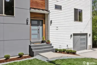 The entryway offers custom wood accents for a Pacific Northwest feel.
