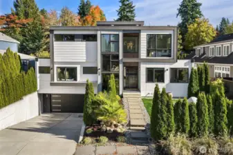 Experience modern style with upscale luxury in this better than new, beautiful Clyde Hill home designed by Medici Architects.