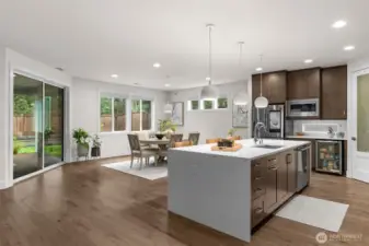 Wine and dine in this expansive kitchen and dining room.