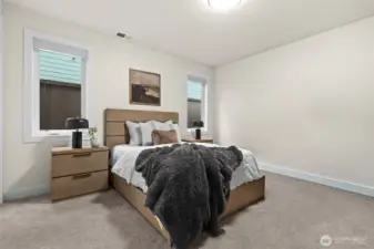 Enjoy this guest suite attached with bathroom, or convert into a primary room on the main floor.