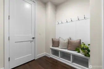 Access from the garage straight to the mudroom makes hasty entrances or exits an easier transition.