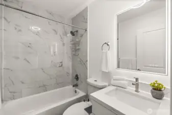 Full Bath with backlit vanity mirror