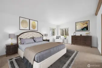 spacious primary bedroom retreat with ample room for a king-size bed and additional furnishings. Photo virtually staged.