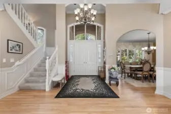 view of front entrance, formal dining room on right