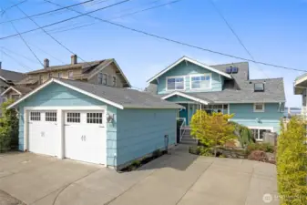 Double car garage with solar panels for EV charging.