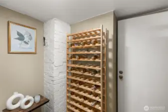 Wine Cellar // Mud Room off of the garage. Note that the door is just covering the mirror.
