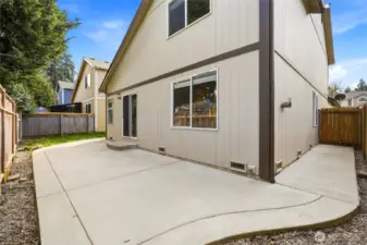 Large patio with pathways on both sides of the home