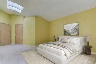 The primary bedroom has all the space you have been looking for! With tall, vaulted ceilings and skylights this bedroom is something to behold! Photo is virtually staged.