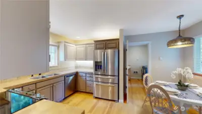 Virtually staged - Kitchen has dining nook