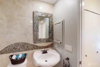 Guest Bathroom with beautiful tile work - plus a heated floor.