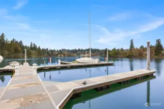 The property includes an impressive 62-foot slip, a wonderful addition for boating enthusiasts, providing direct access to the water and enhancing your lifestyle.