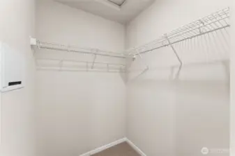 Primary closet. Photo's are for representational purposes only. Colors and finishes may differ.