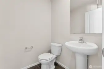 Powder room on main. Photo's are for representational purposes only. Colors and finishes may differ.