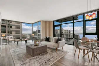 Floor to ceiling windows provide expansive city views, Mt Rainier, & Elliott Bay