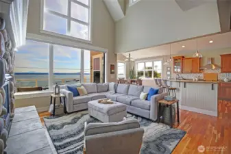 The connected living room, kitchen and dining all have magnificent views!
