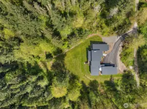 So perfectly sited on 4.53 Acres taking great advantage of the sun and light but preserving the original wooded  areas, as nature intended! This is truly a "nature lover's" paradise. A world away, but only 1 mile to all the special Duvall amenities: Parks, Shopping, Miles of Trails, Restaurants and More!