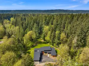 Welcome home to the tranquility of nature without sacrificing proximity to urban conveniences. Truly special!
