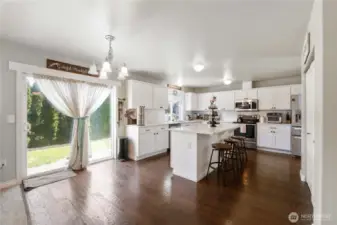 Another view of the kitchen and eating nook. New Microwave & Dishwasher!