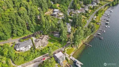 can you see the dock and the home in the trees?