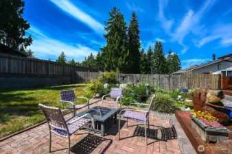 Brick patio to sit around the fire pit!
