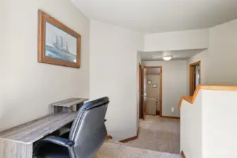 Main house: Guest bedrooms on right and left bathroom straight ahead.