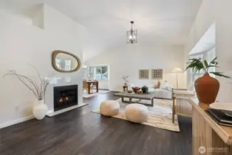 Newer luxury vinyl plank flooring throughout the living space, fresh paint and lighting fixtures you'll love.